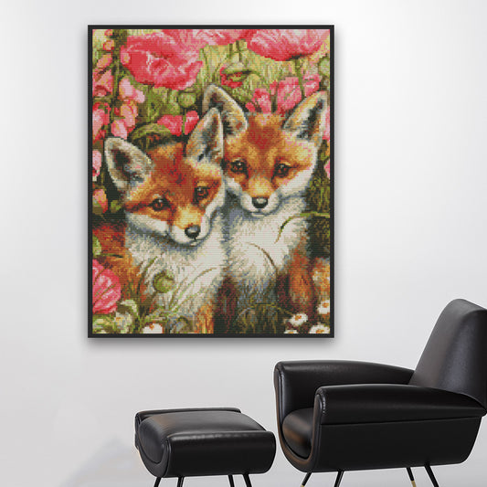 Quadro su tela Volpi fra fiori