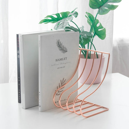 Reggilibri metallico con archi ondulati