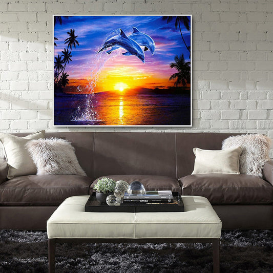 Quadro su tela Delfini che saltano al tramonto