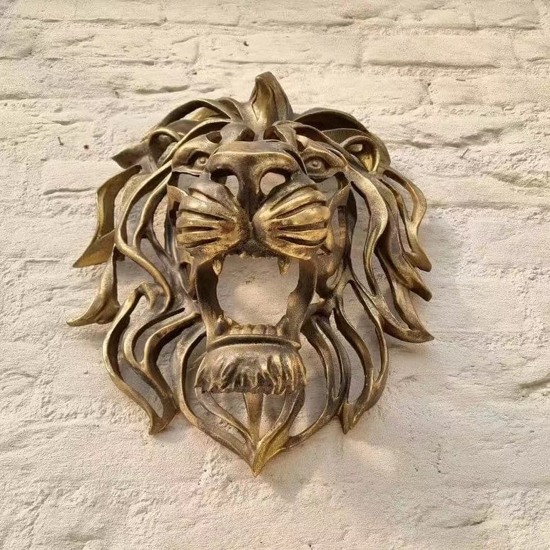 Scultura testa di leone da parete