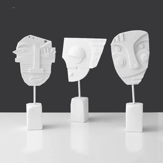Scultura volto e fiore