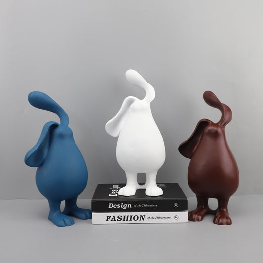 Sculture conigli marrone bianco blu