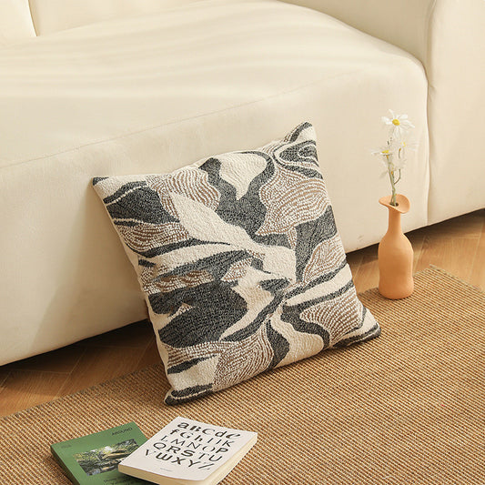 Copricuscino beige con motivo floreale