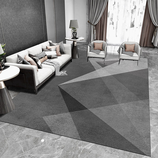 Tappeto geometrico grigio e nero con