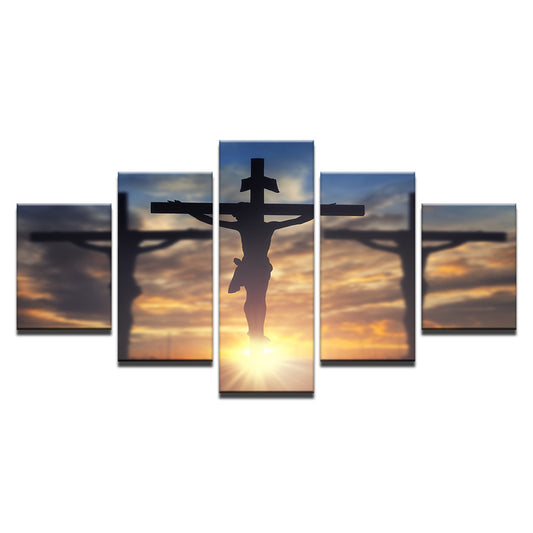 Quadro su tela Gesù Cristo crocifisso al tramonto dorato