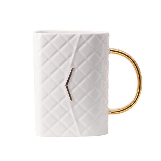 Tazza trapuntata ceramica manico dorato