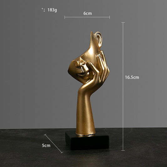 Sculture volti dorate emozioni tre