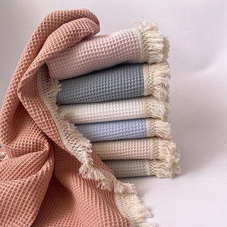 Coperta con nappine