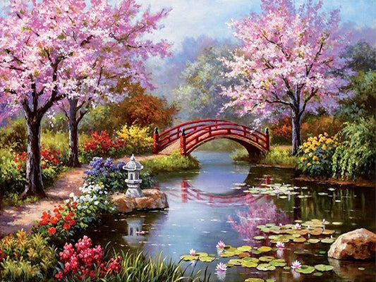 Quadro su tela Ciliegio rosa su ruscello con fiori