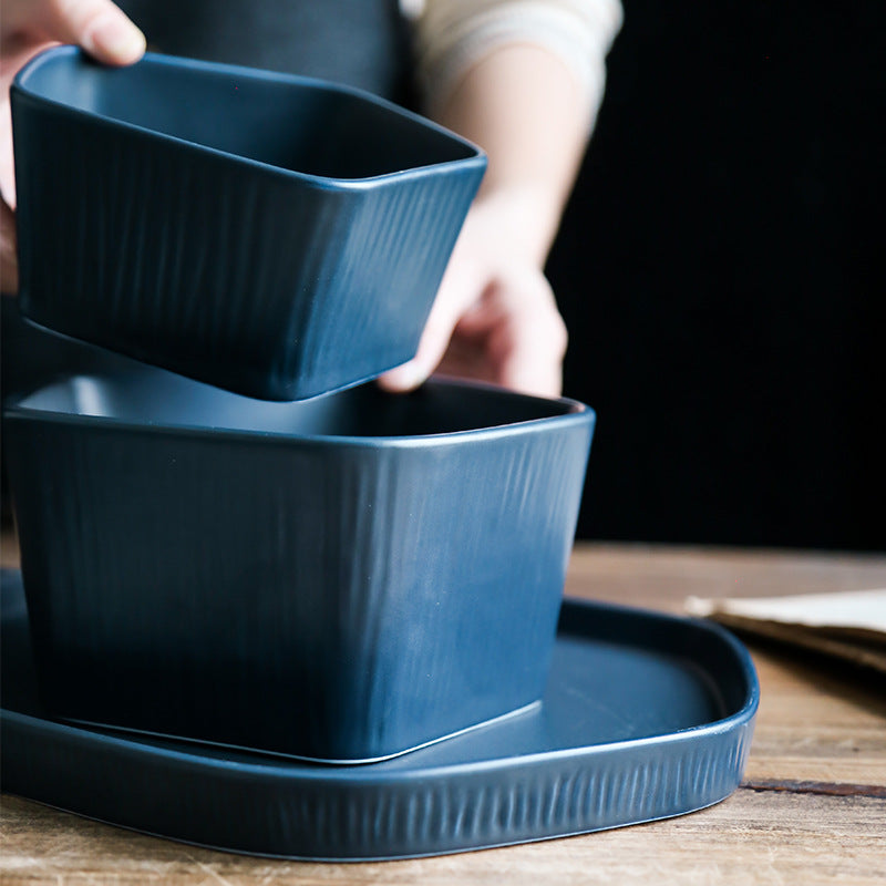 Piatto ceramica con manico in legno