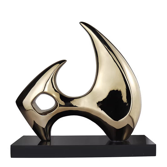 Scultura bicolore su piedistallo nero