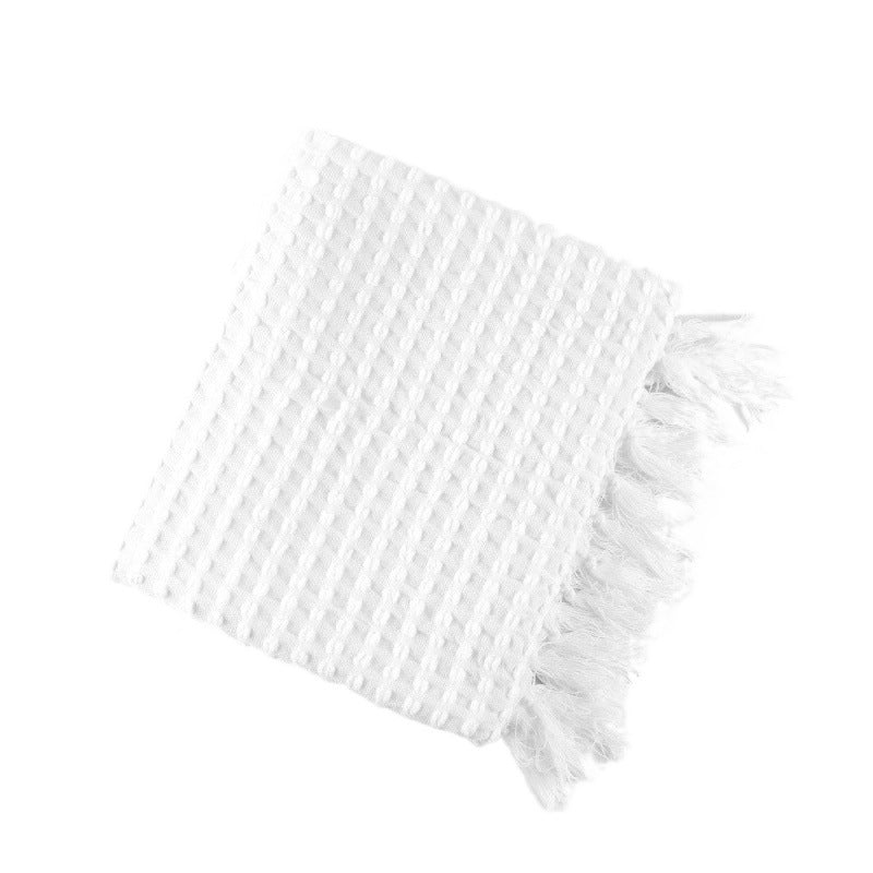 Coperta in lana con nappine
