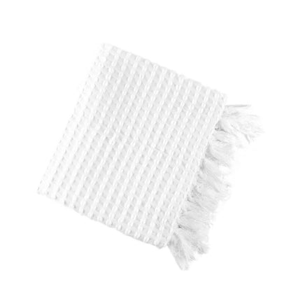 Coperta in lana con nappine