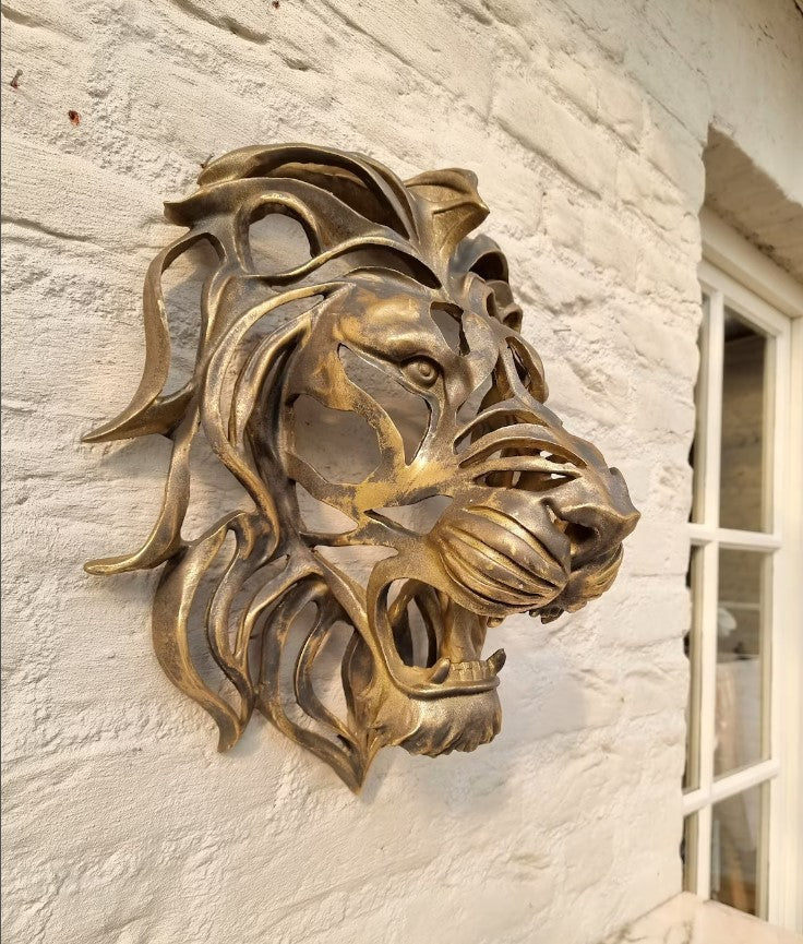 Scultura testa leone