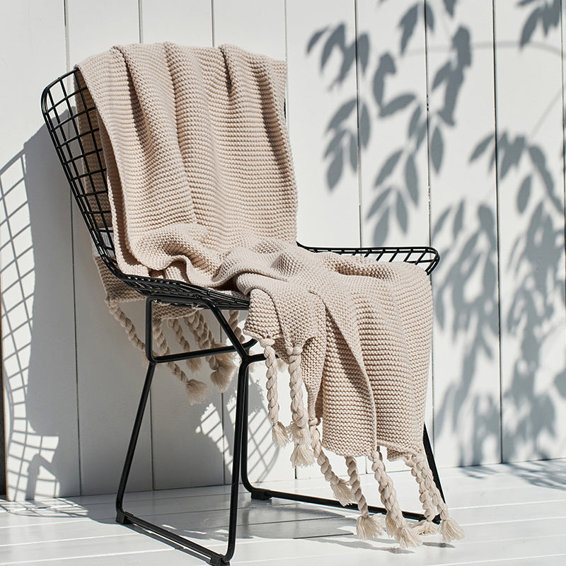Coperta maglia con nappe