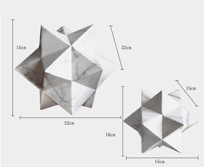 Stella geometrica in marmo