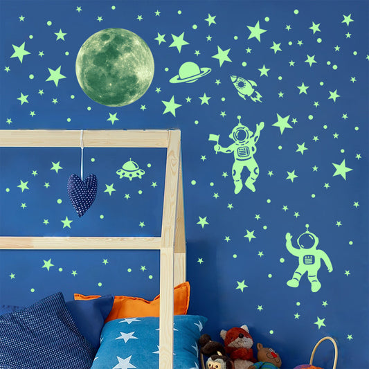 Adesivo murale Astronauta e pianeta luminosi