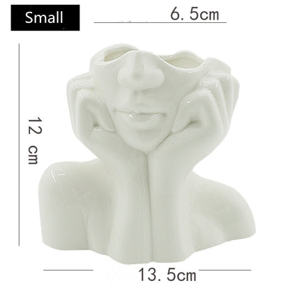 Vaso figura umana