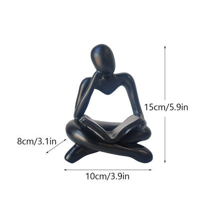 Statuetta lettura resina