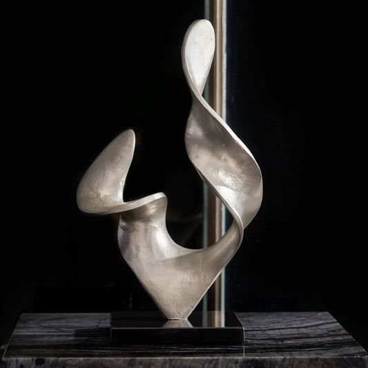 Scultura forme intrecciate bianche
