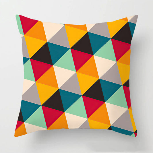 Cuscino multicolore con geometria astratta