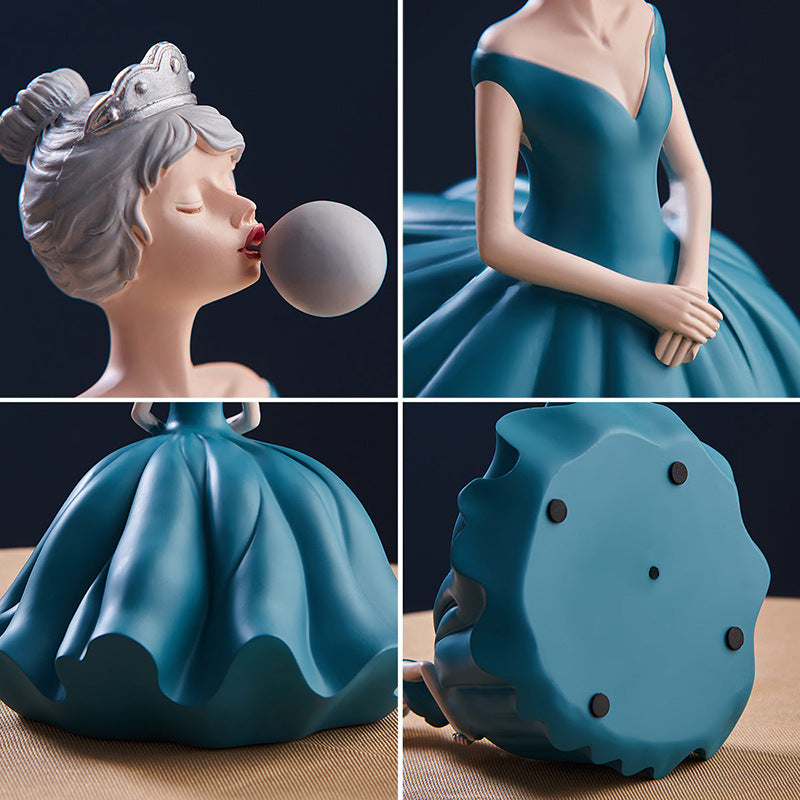 Statuina ragazza soffia bolle