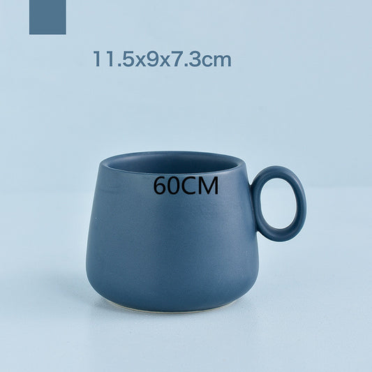 Tazza azzurra panciuta con manico