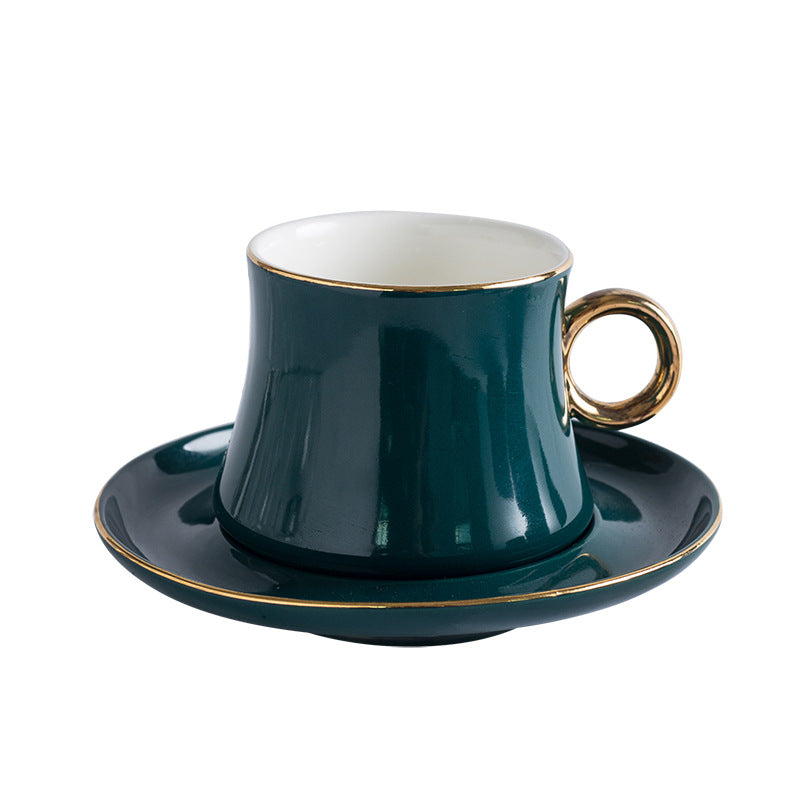 Tazza da caffè con piattino verde