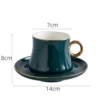 Tazza da caffè con piattino verde
