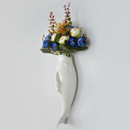 Scultura murale pesce