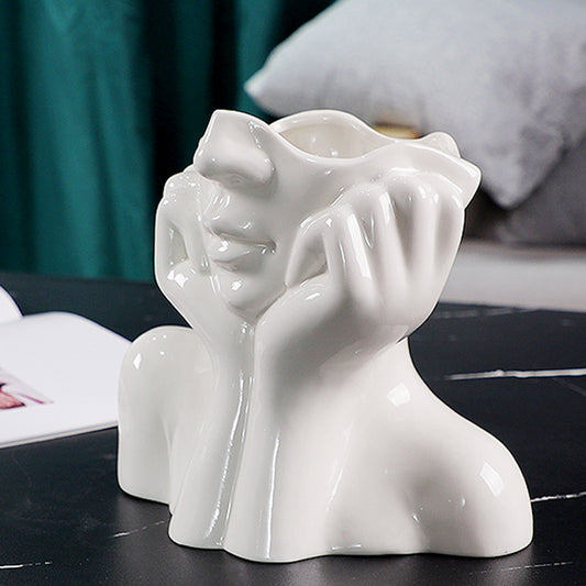 Vaso figura umana