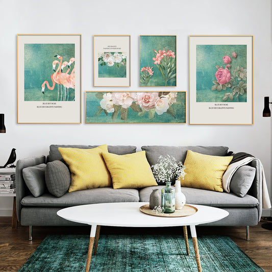 Quadro su tela Fiori e fenicotteri su verde acqua