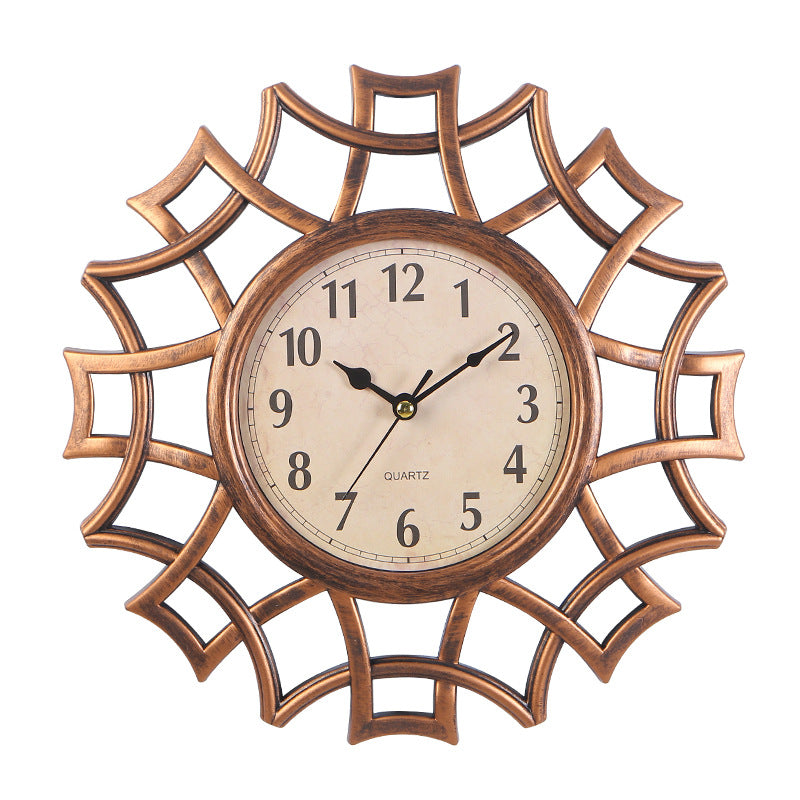Orologio da parete Stella ornamentale dorata