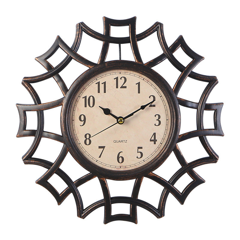 Orologio da parete Stella ornamentale dorata