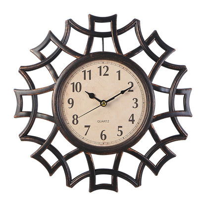 Orologio da parete Stella ornamentale dorata