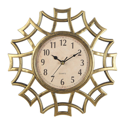 Orologio da parete Stella ornamentale dorata