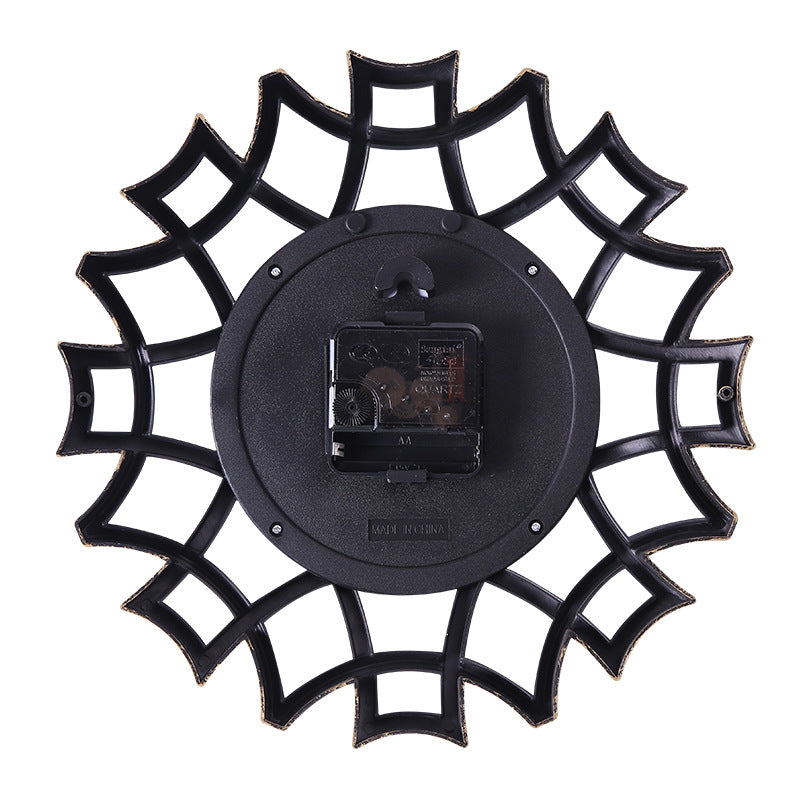 Orologio da parete Stella ornamentale dorata