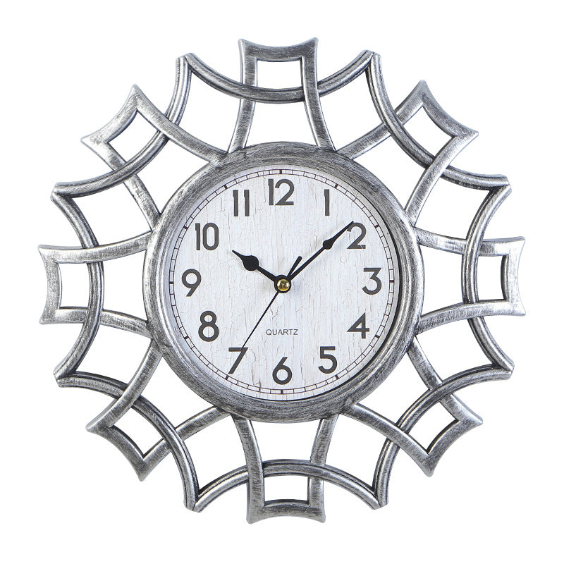 Orologio da parete Stella ornamentale dorata