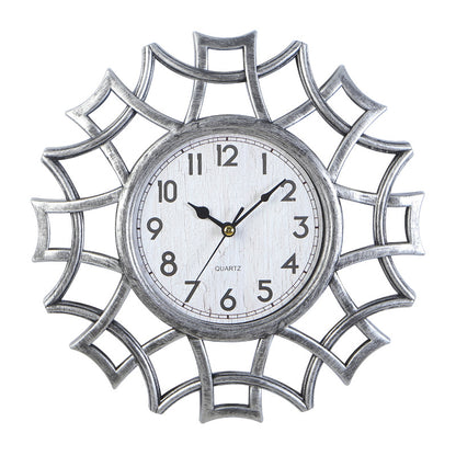 Orologio da parete Stella ornamentale dorata