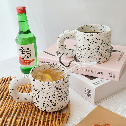 Tazza con inchiostro sparso