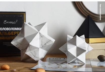 Stella geometrica in marmo