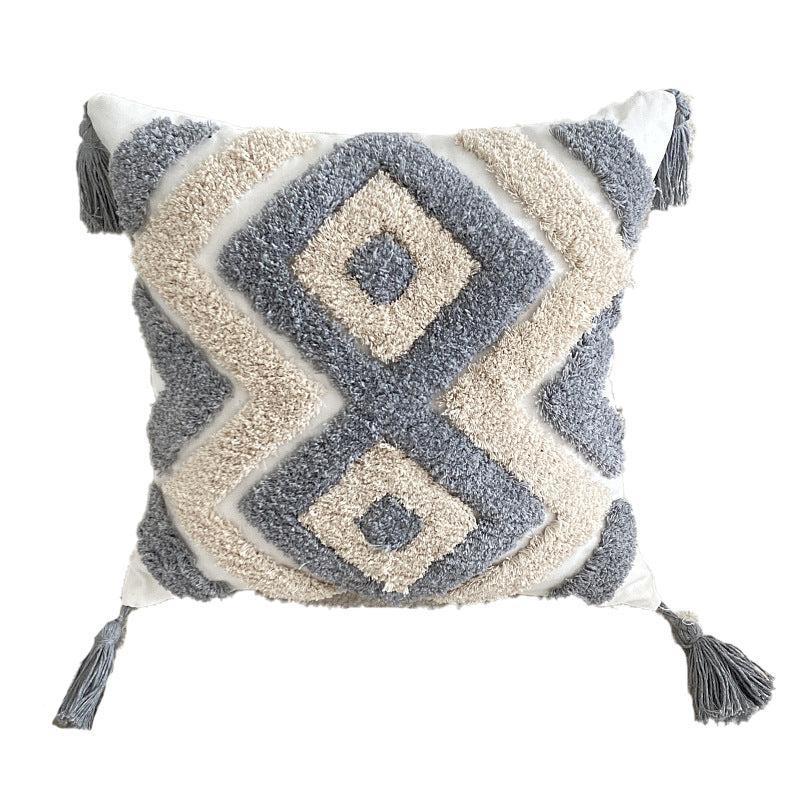 Cuscino boho con nappine