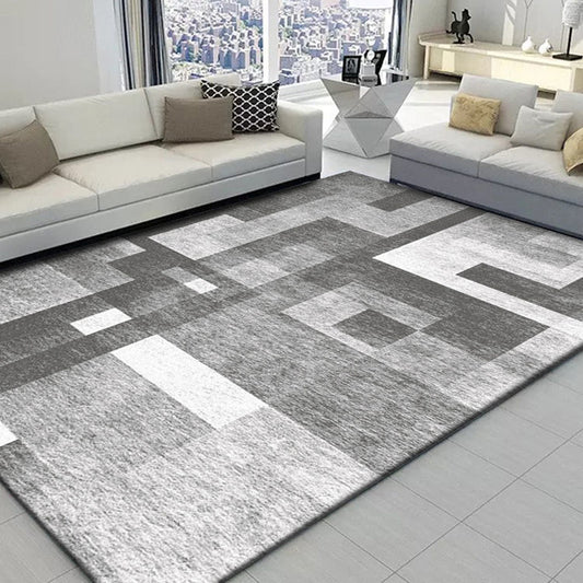 Tappeto blocchi geometrici grigio e bianco