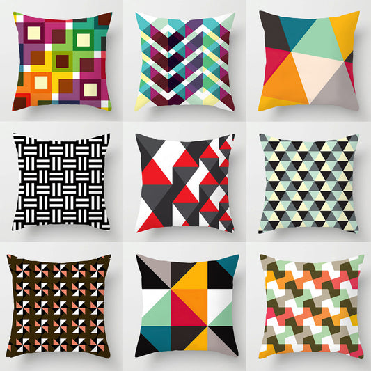 Cuscino multicolore con geometria astratta