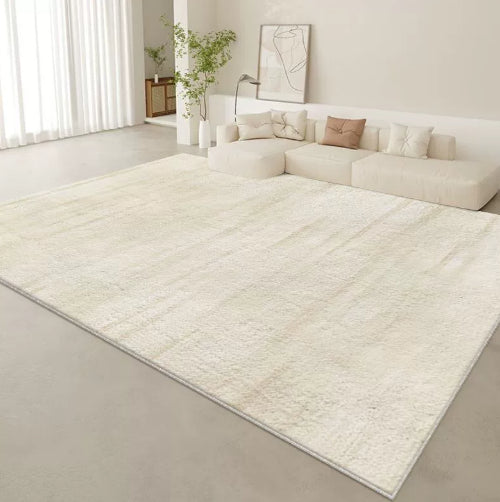 Tappeto beige con bordo bianco