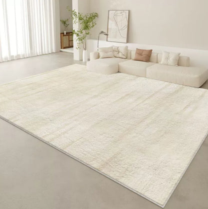 Tappeto beige con bordo bianco