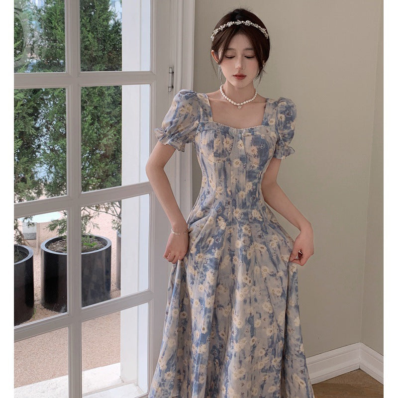 Vestito blu floreale