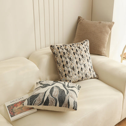 Copricuscino beige con motivo floreale