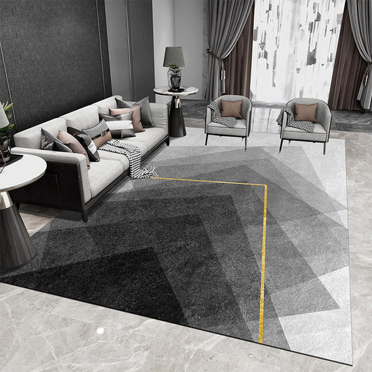 Tappeto geometrico grigio e nero con
