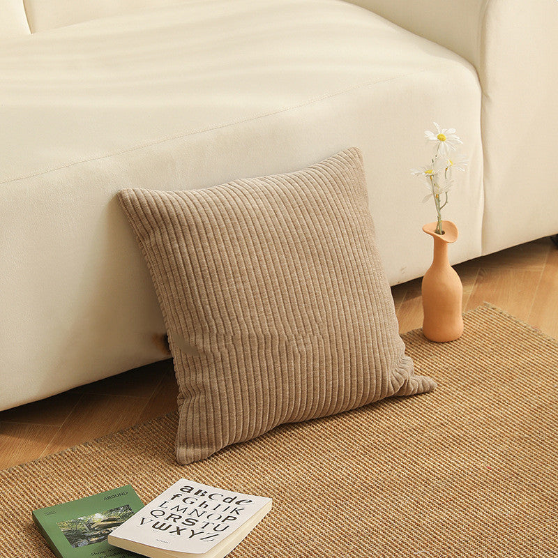Copricuscino beige con motivo floreale